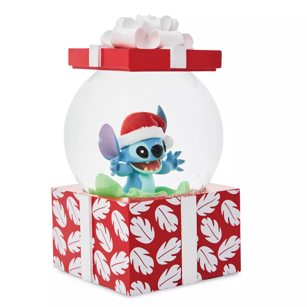 Amid tropical decoration, Stitch, dressed as ''old St. Nick,'' pops out from a festive holiday gift box. A snow flurry follows when the snow globe is shaken, making this a merry Christmas heirloom to treasure for years to come. Magic in the details Fully sculpted Santa Stitch figure inside globe Shake to see a shower of snow in Waterball ''Wrapped gift box'' base Box lid and bow topper Inspired by Disney's Lilo & Stitch (2002) By Department 56